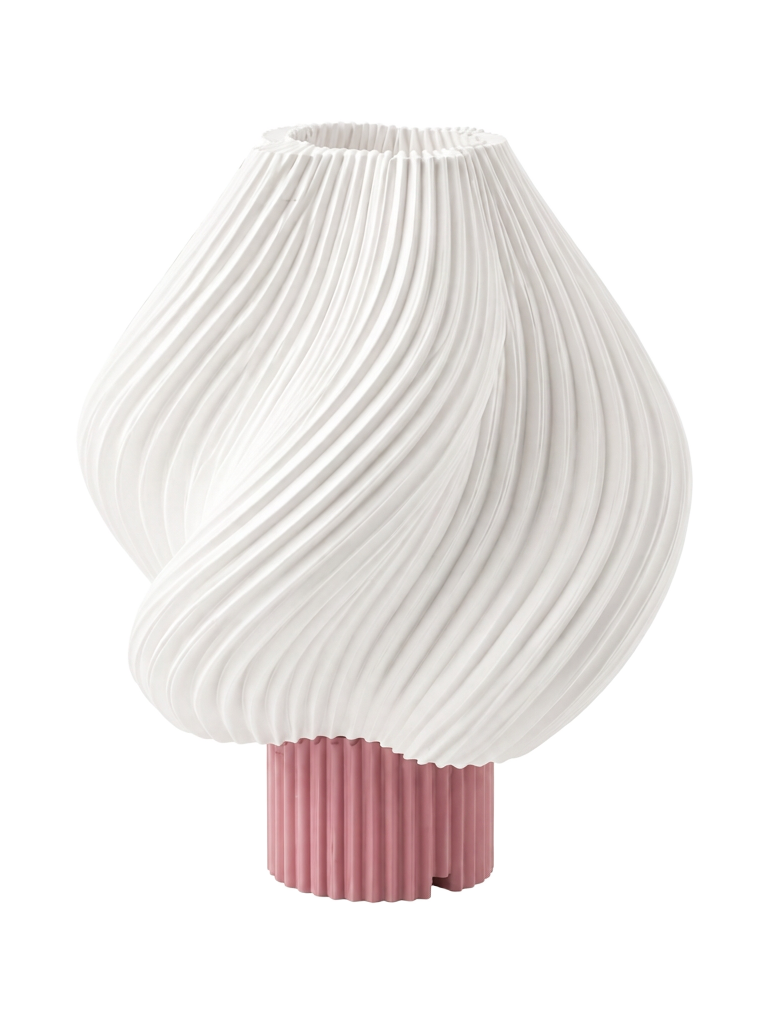 Volute sculptural lamp with flowing ivory folds and a rose base, unlit